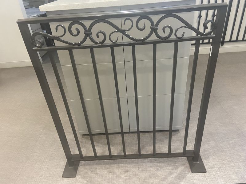 Residential aluminum railing with decorative trim installed on a New Jersey porch